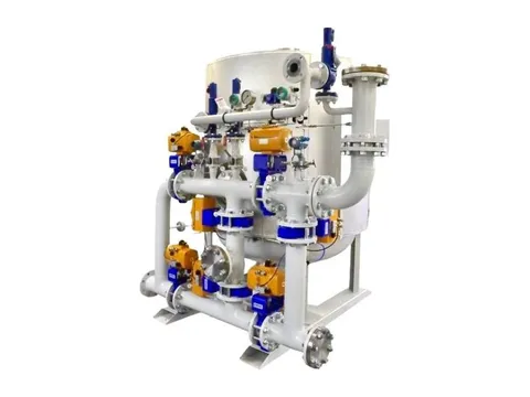 A skid-mounted hydrogen purification unit with its vessel, flanged pipework and automated valves
