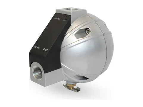 A mechanical float drain with a rounded silver float chamber and a black inlet and outlet block