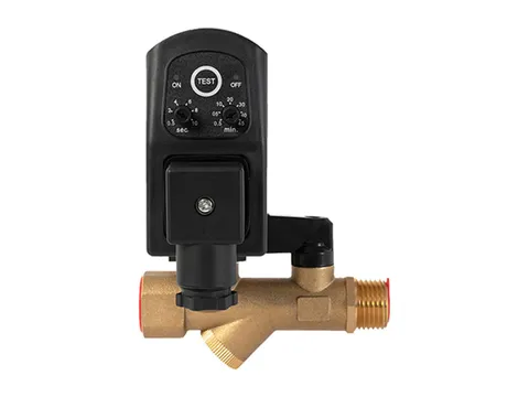 A timer drain with a black timer head and test button on a brass solenoid valve with a built-in strainer